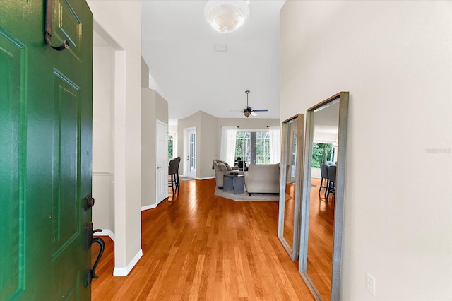 21705 67th Ave E, Bradenton, FL 34211 - entrance foyer with light wood-type flooring, ceiling fan, and high vaulted ceiling