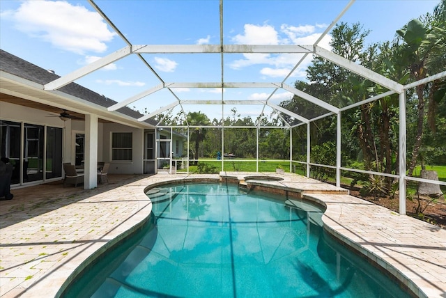 21705 67th Ave E, Bradenton, FL 34211 - view of pool with a patio area, a pool with connected hot tub, a ceiling fan, and glass enclosure
