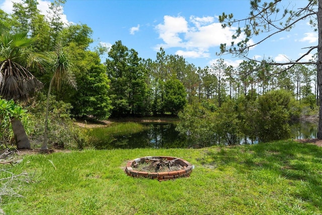 21705 67th Ave E, Bradenton, FL 34211 - view of yard featuring an outdoor fire pit and a water view