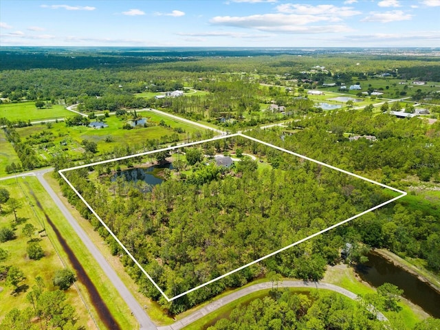 21705 67th Ave E, Bradenton, FL 34211 - aerial view of property and surrounding area featuring property parcel outlined and a nearby body of water