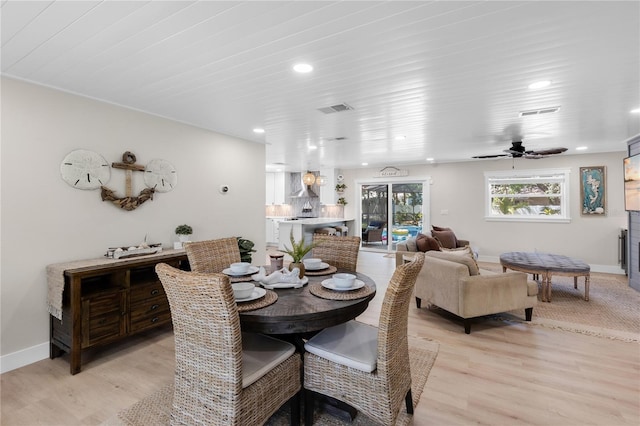327 Francis Dr, Apollo Beach, FL 33572 - dining area featuring light wood finished floors and recessed lighting