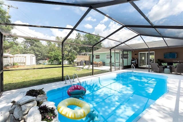 327 Francis Dr, Apollo Beach, FL 33572 - swimming pool featuring a storage unit, a patio area, an outdoor hangout area, and a yard