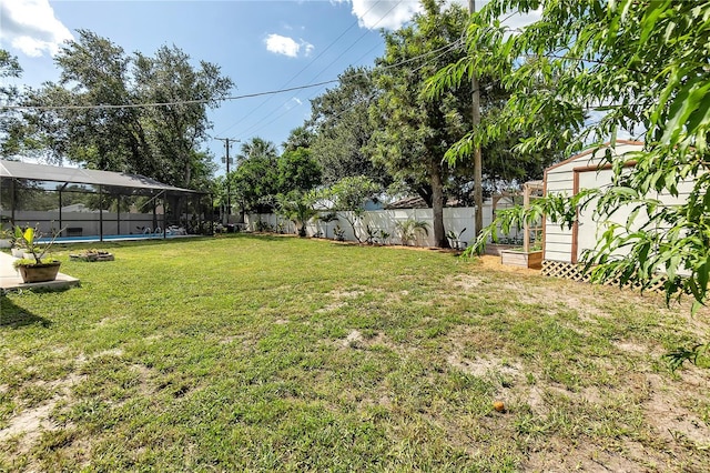 327 Francis Dr, Apollo Beach, FL 33572 - fenced backyard with a swimming pool