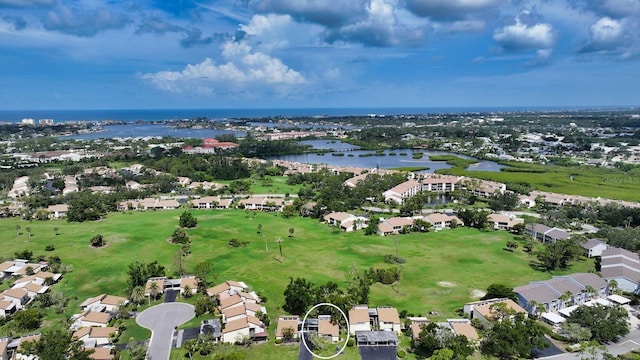 718 White Pine Tree Rd Unit 80, Venice, FL 34285 - aerial perspective of suburban area with a nearby body of water and a golf club
