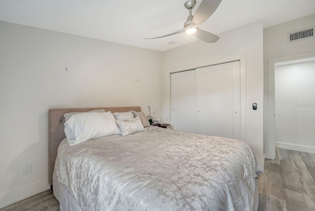 718 White Pine Tree Rd Unit 80, Venice, FL 34285 - bedroom featuring light wood-type flooring, a closet, and ceiling fan