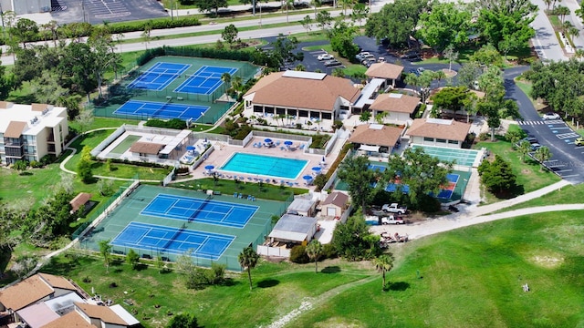 718 White Pine Tree Rd Unit 80, Venice, FL 34285 - aerial overview of property's location with a pool area