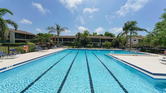718 White Pine Tree Rd Unit 80, Venice, FL 34285 - community pool featuring a patio area