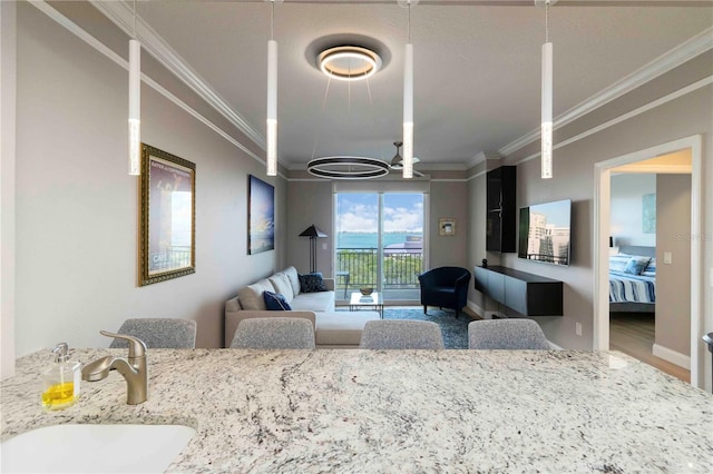 750 N Tamiami Trl Unit 1005, Sarasota, FL 34236 - living area featuring crown molding and wood finished floors