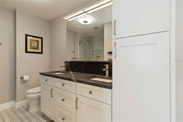 750 N Tamiami Trl Unit 1005, Sarasota, FL 34236 - full bath with a marble finish shower, double vanity, tile patterned floors, and tasteful backsplash