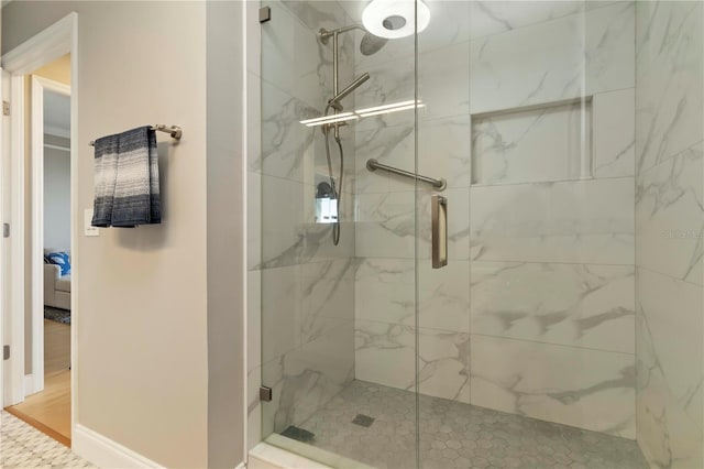 750 N Tamiami Trl Unit 1005, Sarasota, FL 34236 - full bathroom featuring a marble finish shower and ensuite bathroom