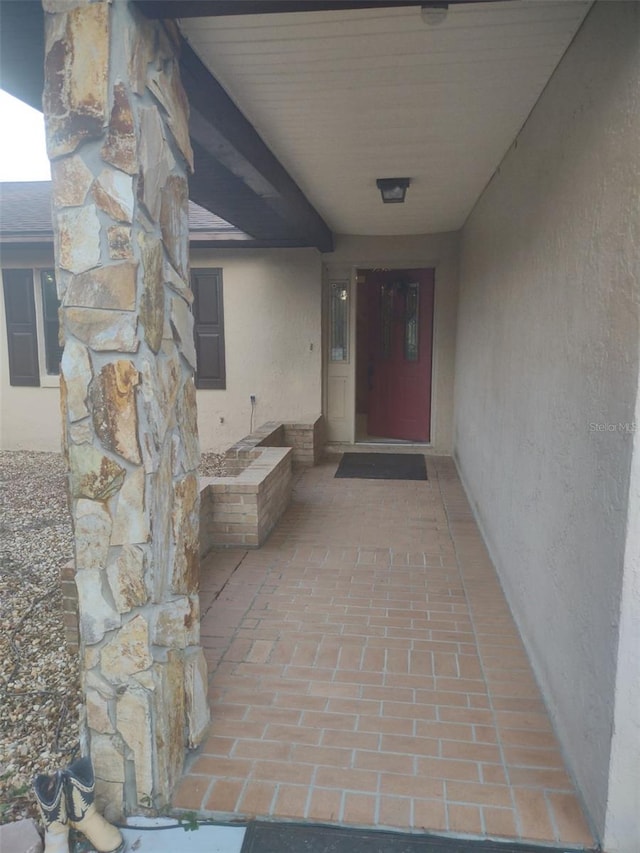 8851 S Brittany Path, Inverness, FL 34452 - view of exterior entry featuring stucco siding