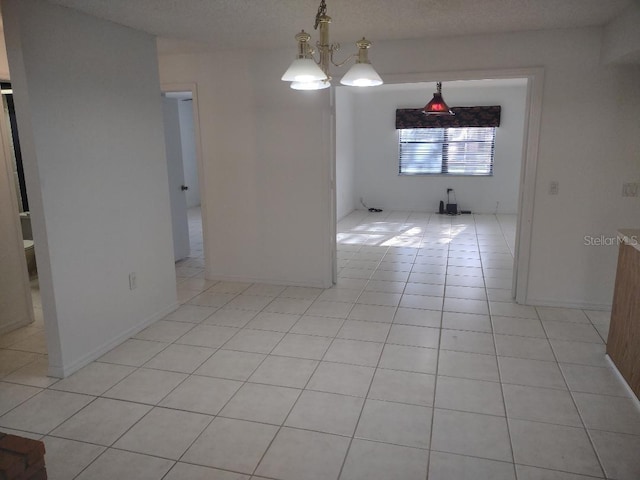 8851 S Brittany Path, Inverness, FL 34452 - spare room with light tile patterned floors and baseboards