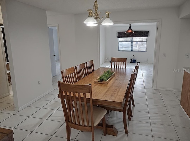 8851 S Brittany Path, Inverness, FL 34452 - dining space with light tile patterned floors and a chandelier
