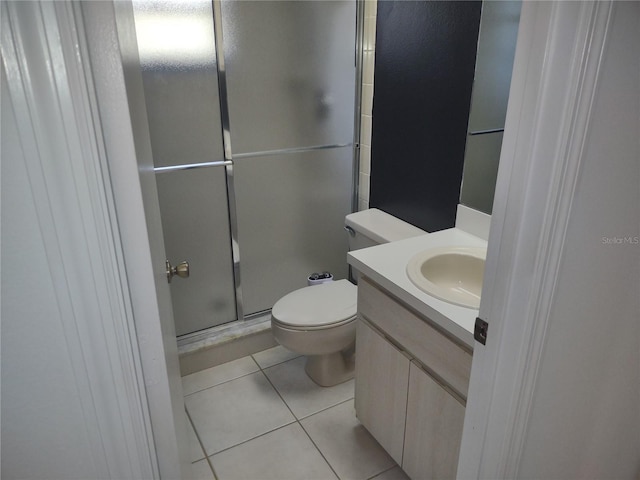 8851 S Brittany Path, Inverness, FL 34452 - bathroom with a stall shower, vanity, and tile patterned flooring