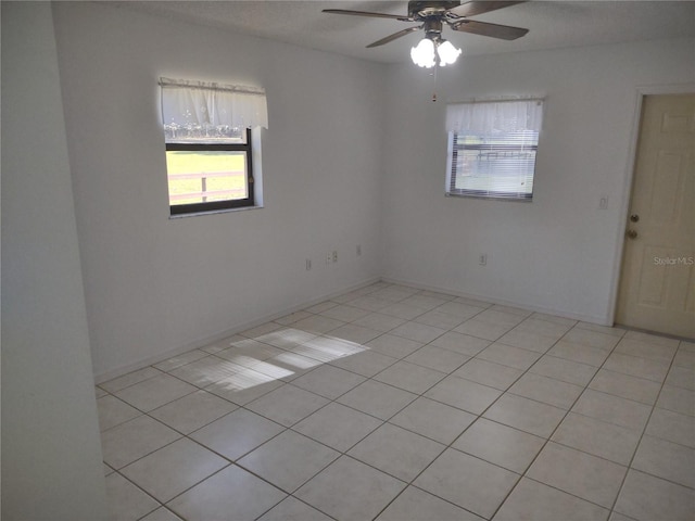 8851 S Brittany Path, Inverness, FL 34452 - unfurnished room with a ceiling fan and light tile patterned floors