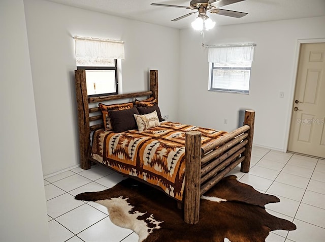 8851 S Brittany Path, Inverness, FL 34452 - bedroom featuring light tile patterned floors and a ceiling fan