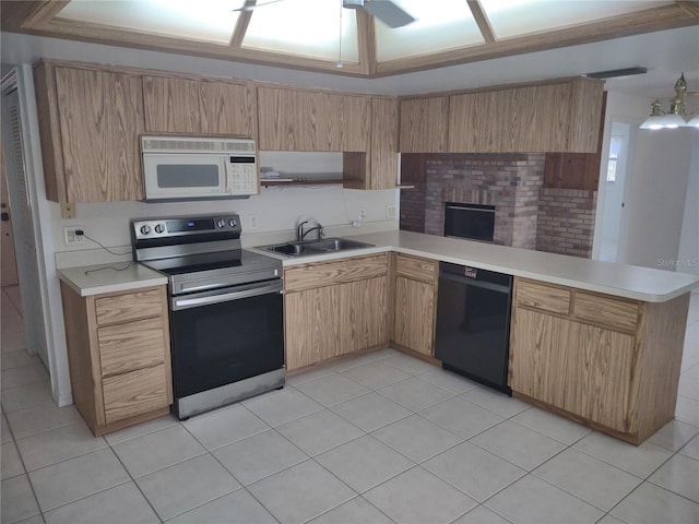 8851 S Brittany Path, Inverness, FL 34452 - kitchen with stainless steel range with electric stovetop, black dishwasher, white microwave, a peninsula, and light countertops