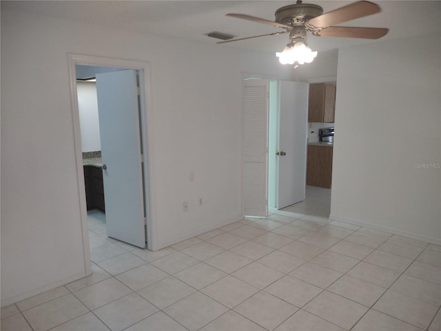 8851 S Brittany Path, Inverness, FL 34452 - unfurnished room with a ceiling fan and light tile patterned flooring
