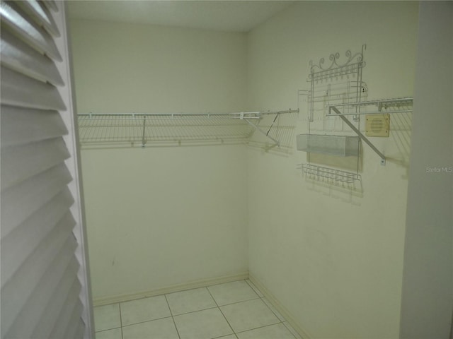 8851 S Brittany Path, Inverness, FL 34452 - walk in closet featuring light tile patterned floors
