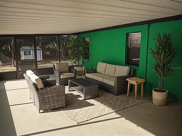8851 S Brittany Path, Inverness, FL 34452 - view of patio featuring a storage shed and an outdoor living space