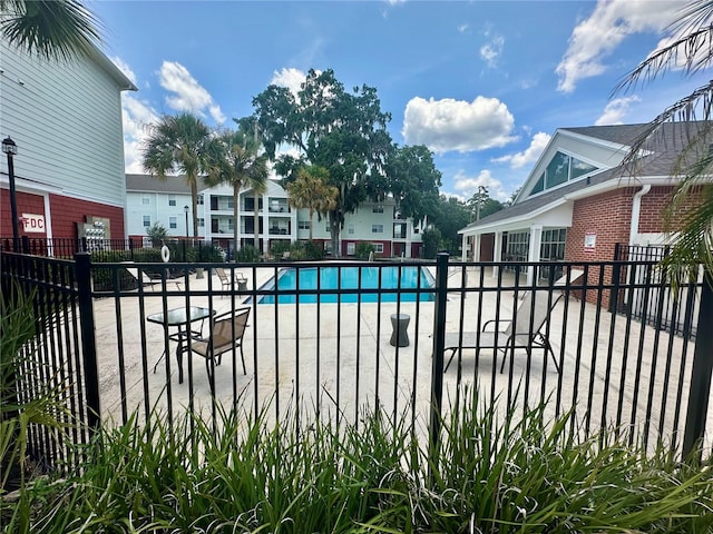 2360 SW Archer Rd Unit 206, Gainesville, FL 32608 - community pool with a patio