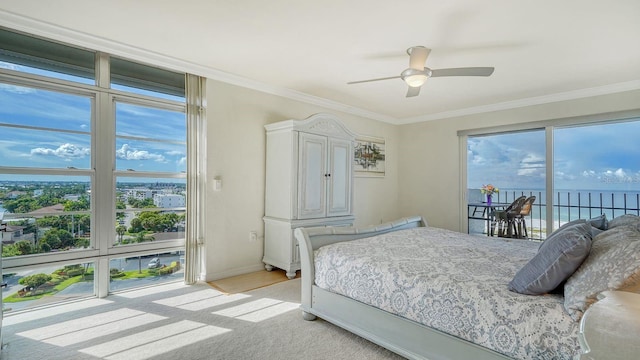1 Benjamin Franklin Dr Unit 93, Sarasota, FL 34236 - bedroom featuring access to exterior, ornamental molding, a water view, and a ceiling fan