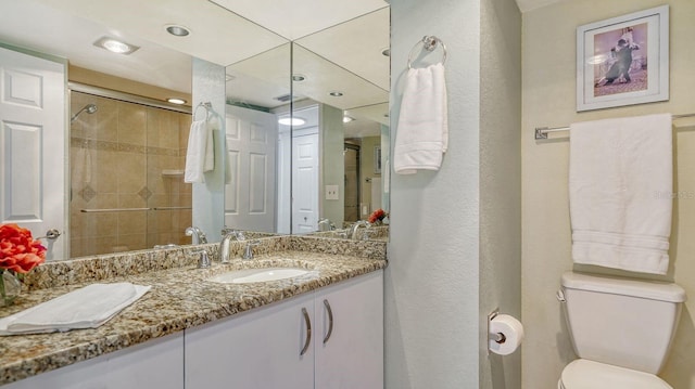 1 Benjamin Franklin Dr Unit 93, Sarasota, FL 34236 - bathroom featuring vanity, a stall shower, and recessed lighting