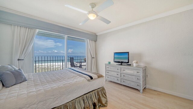 1 Benjamin Franklin Dr Unit 93, Sarasota, FL 34236 - bedroom featuring access to outside, ornamental molding, light wood-style flooring, and a ceiling fan