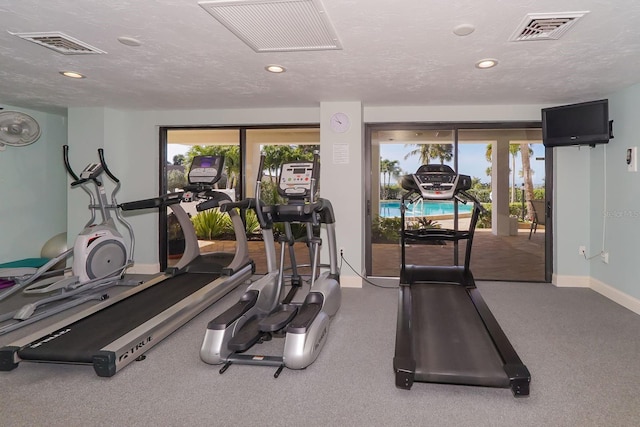 1 Benjamin Franklin Dr Unit 93, Sarasota, FL 34236 - exercise room featuring recessed lighting and carpet floors