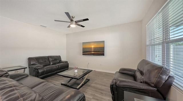 3813 Willow Branch Pl, Palmetto, FL 34221 - living area featuring wood finished floors and a ceiling fan