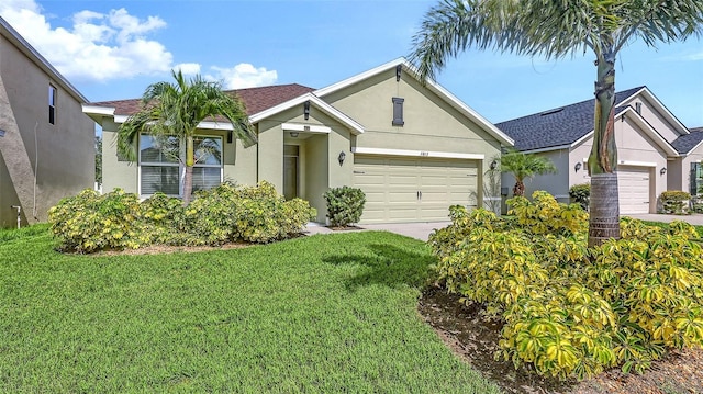 3813 Willow Branch Pl, Palmetto, FL 34221 - view of front of house featuring a garage, stucco siding, driveway, a front yard, and roof with shingles