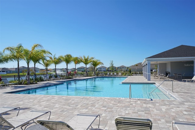 3813 Willow Branch Pl, Palmetto, FL 34221 - community pool with a patio and a residential view