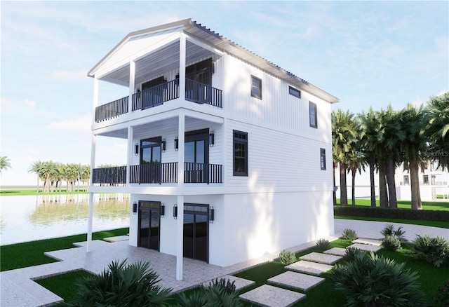 312 Avenida Leona, Sarasota, FL 34242 - back of house with a balcony and a water view