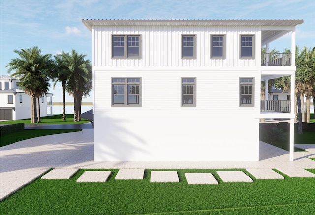312 Avenida Leona, Sarasota, FL 34242 - view of property exterior featuring a balcony and board and batten siding