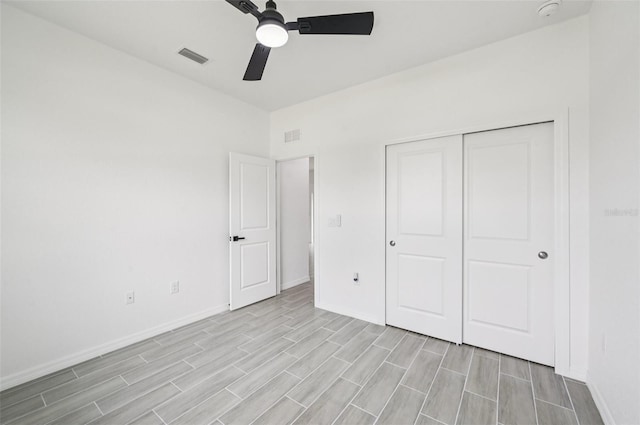 4855 Dragon St, North Port, FL 34288 - unfurnished bedroom featuring light wood finished floors, a closet, and ceiling fan