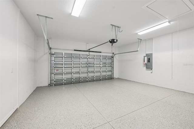 4855 Dragon St, North Port, FL 34288 - garage featuring electric panel and a garage door opener
