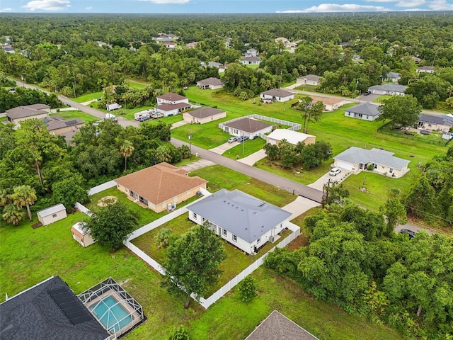 4855 Dragon St, North Port, FL 34288 - aerial view of residential area with a heavily wooded area