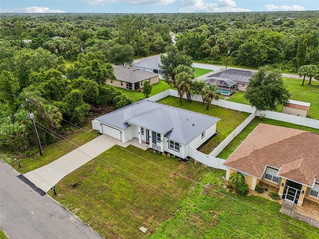 4855 Dragon St, North Port, FL 34288 - view from above of property with a heavily wooded area