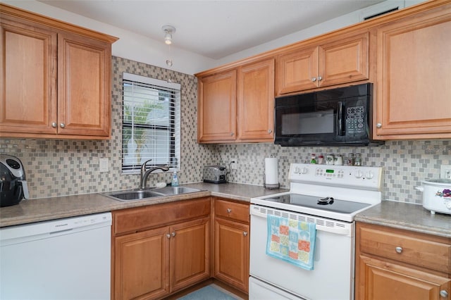 5400 34th St W Unit 5G, Bradenton, FL 34210 - kitchen with white appliances, tasteful backsplash, and brown cabinets