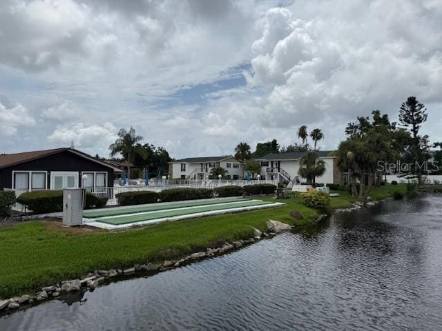5400 34th St W Unit 5G, Bradenton, FL 34210 - surrounding community with a water view and a yard