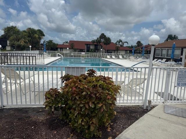 5400 34th St W Unit 5G, Bradenton, FL 34210 - community pool featuring a patio area