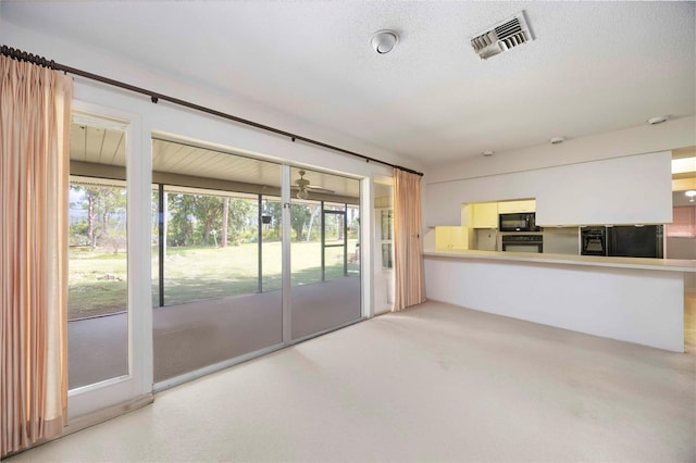 307 Rubens Dr, Nokomis, FL 34275 - unfurnished living room featuring carpet floors