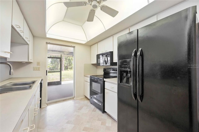 307 Rubens Dr, Nokomis, FL 34275 - kitchen featuring black appliances, light countertops, a ceiling fan, and white cabinets