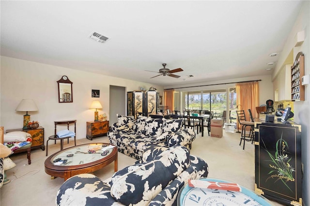307 Rubens Dr, Nokomis, FL 34275 - living room featuring light carpet and ceiling fan