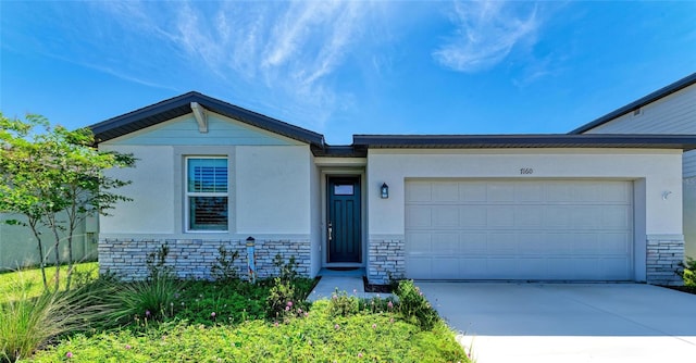 7160 Amelia River Dr, Parrish, FL 34219 - single story home featuring concrete driveway, a garage, stucco siding, and stone siding
