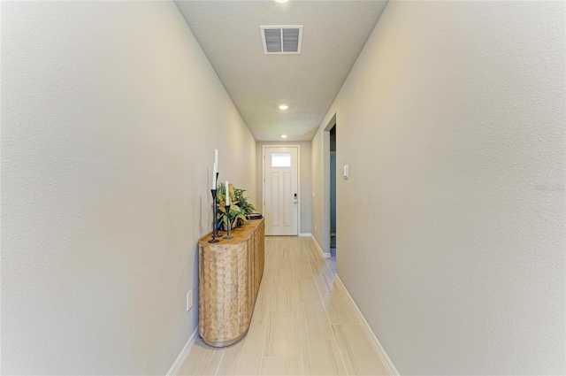 7160 Amelia River Dr, Parrish, FL 34219 - hallway with baseboards and recessed lighting
