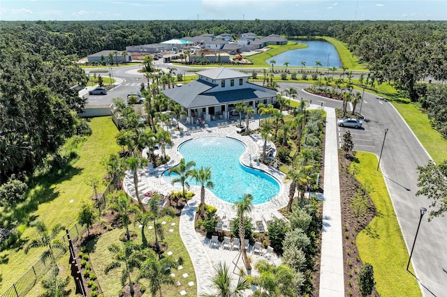 7160 Amelia River Dr, Parrish, FL 34219 - drone / aerial view of a pool area and a nearby body of water