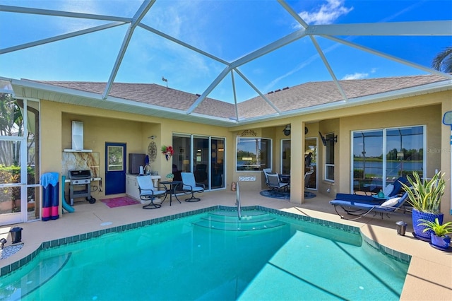 10571 Old Grove Cir, Bradenton, FL 34212 - outdoor pool with area for grilling, a patio area, and glass enclosure