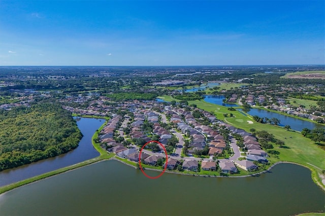 10571 Old Grove Cir, Bradenton, FL 34212 - aerial overview of property's location featuring a large body of water, nearby suburban area, and a golf club