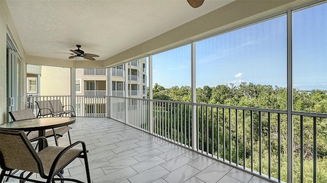 250 Hidden Bay Dr Unit 302, Osprey, FL 34229 - sunroom / solarium featuring a ceiling fan